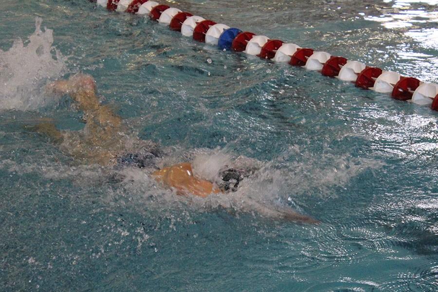Senior Bailey Rumpf leads off the 200 yard freestyle relay.