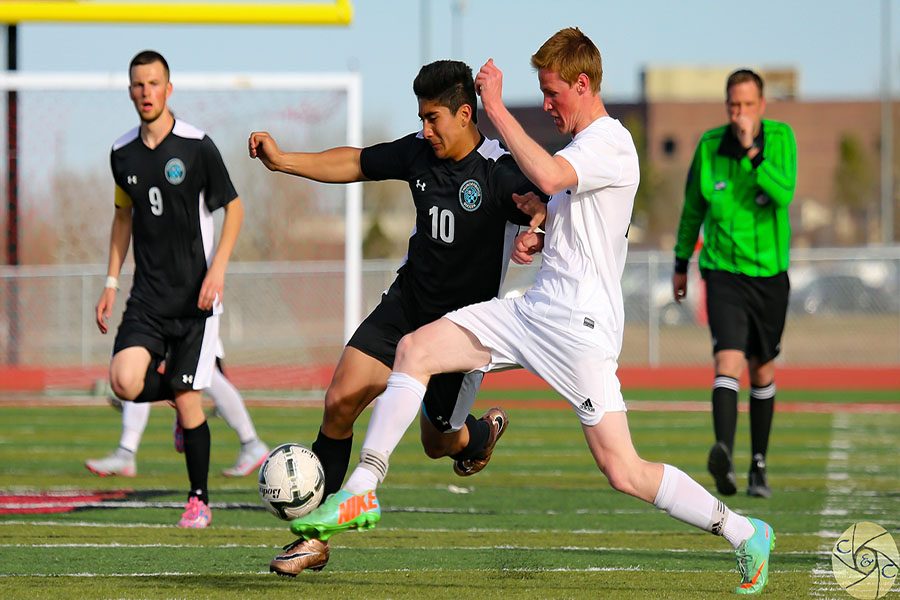 Senior Michael Zuniga battles for a loose ball during the first East-Central soccer game.