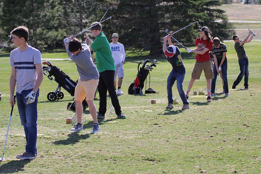 The spring golf team puts in long hours of practice before heading to the Conference Meet at the Airport Golf Course on May 16-17.