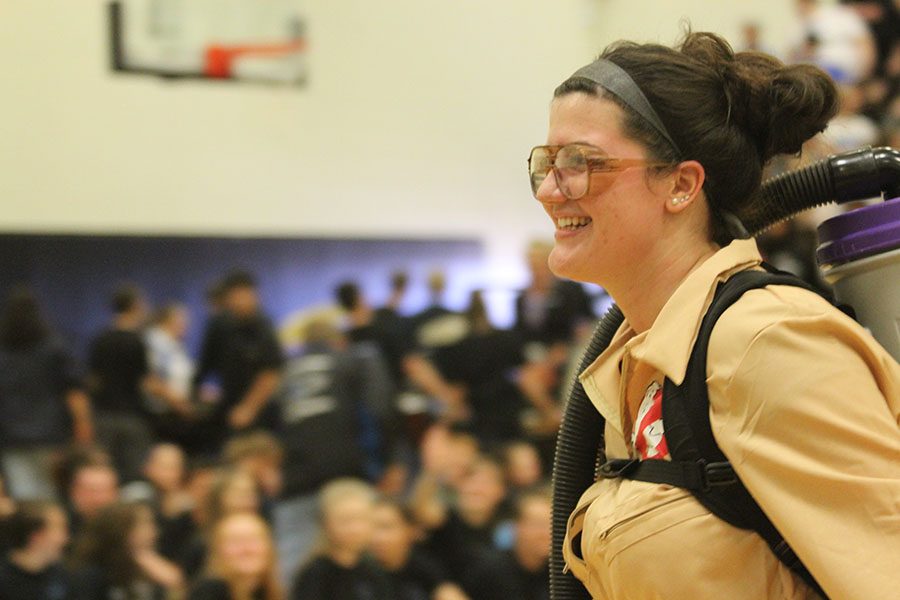 Cossette Stellern smiles after she and her fellow Homecoming court nominees present their Ghostbusters skit.