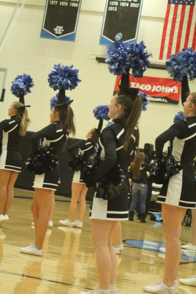 Varsity cheer puts on a show for the rest of the student body.