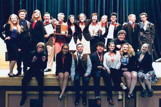 East Speech and Debate shows off their trophies at the end of the State competition in Lander.