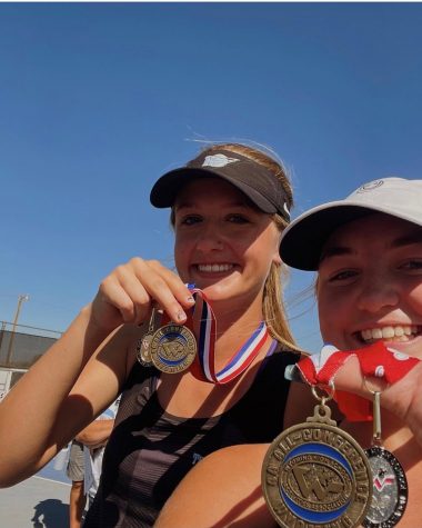 Nedra McIlwaine, 12, (right) and Sydney OBrien,12, (left) show off their state tennis metals.