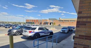 Cheyenne Police Department vehicles are seen at Cheyenne’s East High School after responding to reports of a student carrying a firearm on Sept. 26.