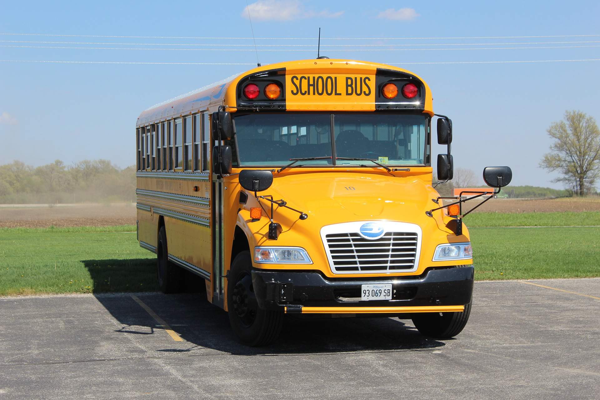 School bus in an empty parking lot.